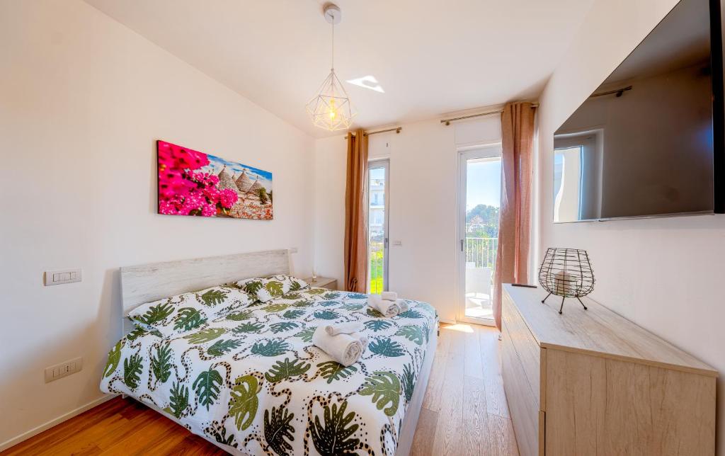 Postel nebo postele na pokoji v ubytování Vista Mare Polignano