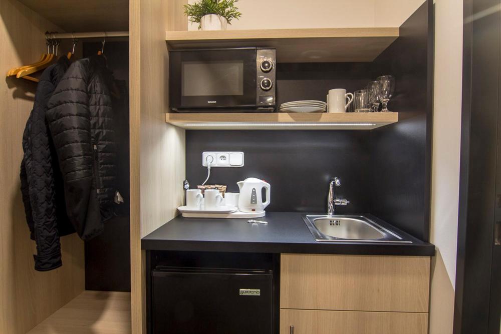 Kuchyň nebo kuchyňský kout v ubytování Hotel Valcha