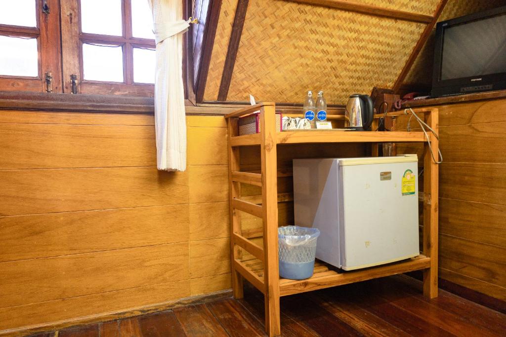 Kuchyň nebo kuchyňský kout v ubytování RoomQuest Golden Triangle Premium Collection