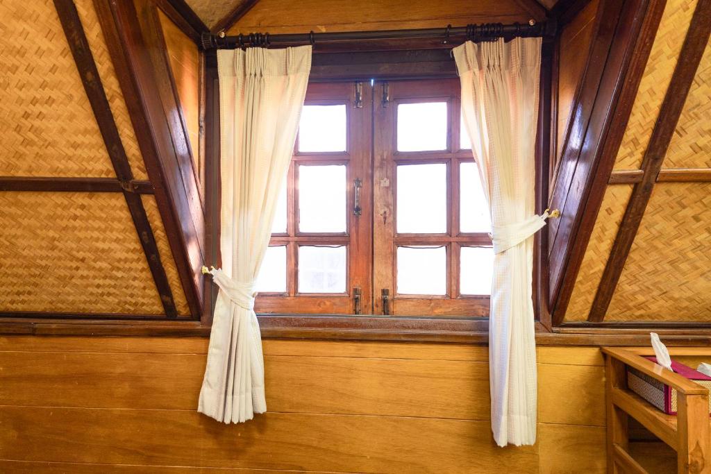 Fotografie z fotogalerie ubytování RoomQuest Golden Triangle Premium Collection v destinaci Chiang Saen