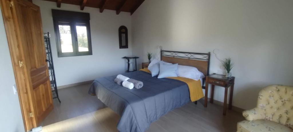 Postel nebo postele na pokoji v ubytování Casa Rural Tulia