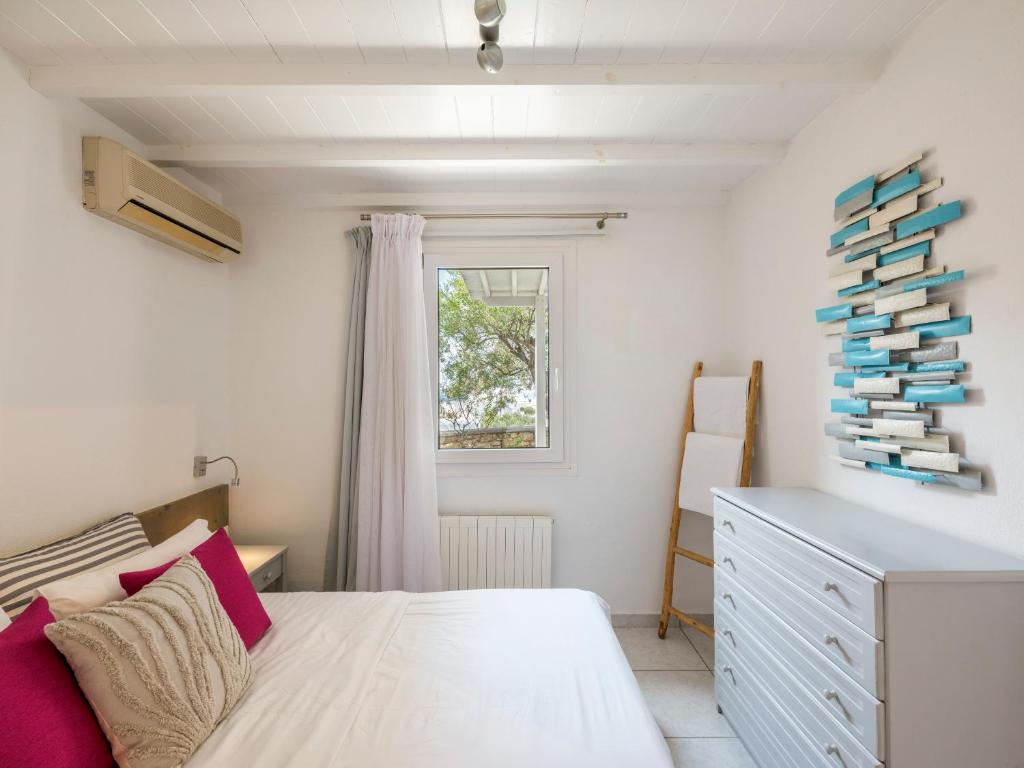 Postel nebo postele na pokoji v ubytování BayBees Sea View Residence