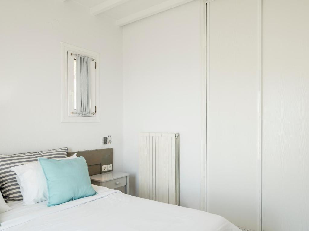 Postel nebo postele na pokoji v ubytování BayBees Sea View Residence