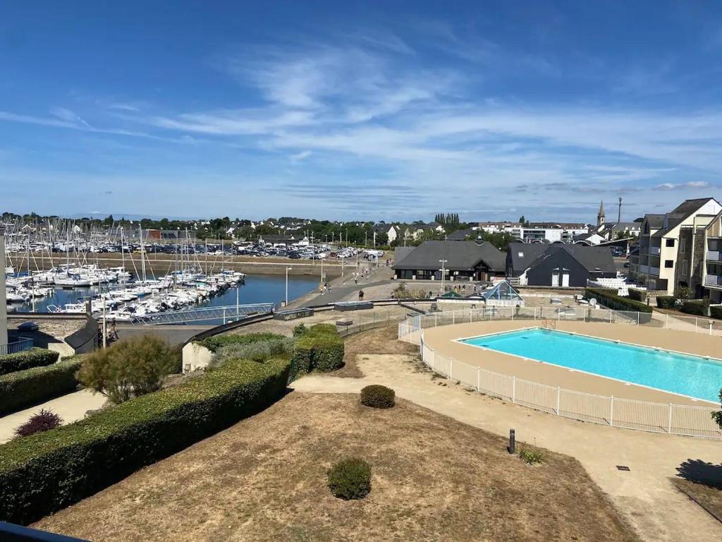 an aerial view of a marina with a swimming pool at Soleil du Crouesty - garage et piscine partagée in Arzon