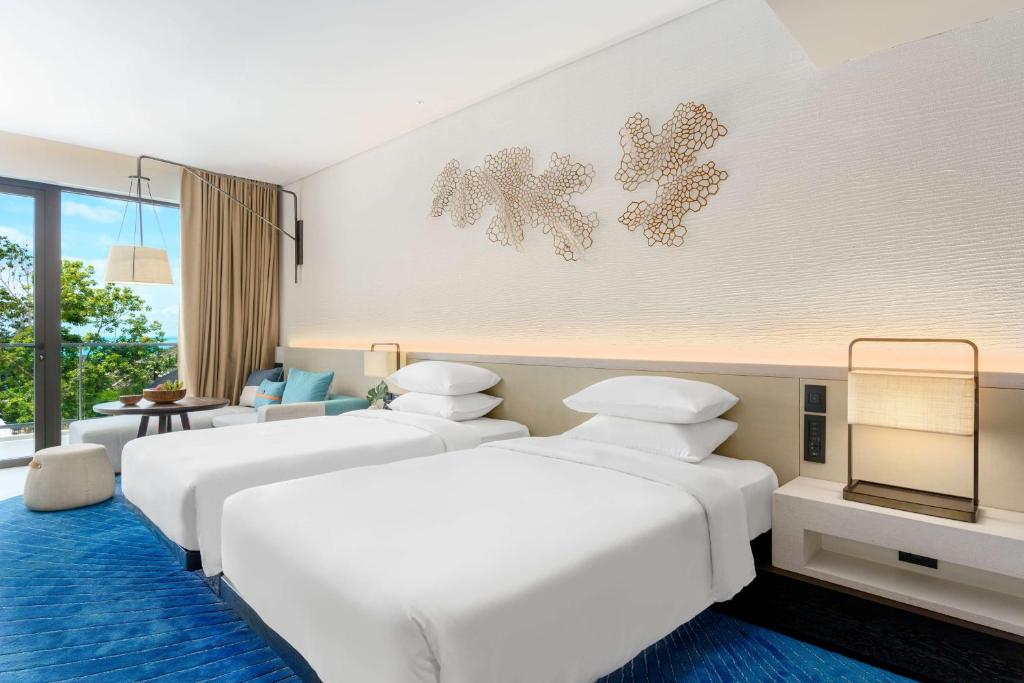Postel nebo postele na pokoji v ubytování Hyatt Regency Koh Samui
