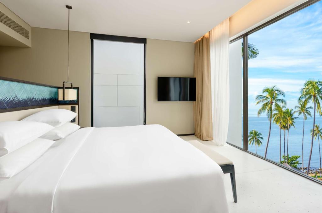 Postel nebo postele na pokoji v ubytování Hyatt Regency Koh Samui