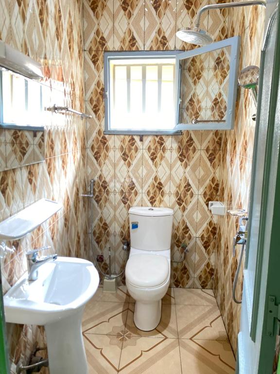 Ein Badezimmer in der Unterkunft Mini villa meublée pour vos séjours