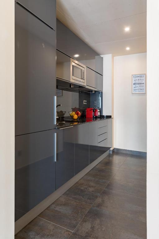 A kitchen or kitchenette at Cituspace Sandoval