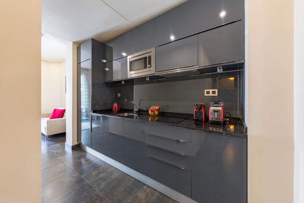 A kitchen or kitchenette at Cituspace Sandoval
