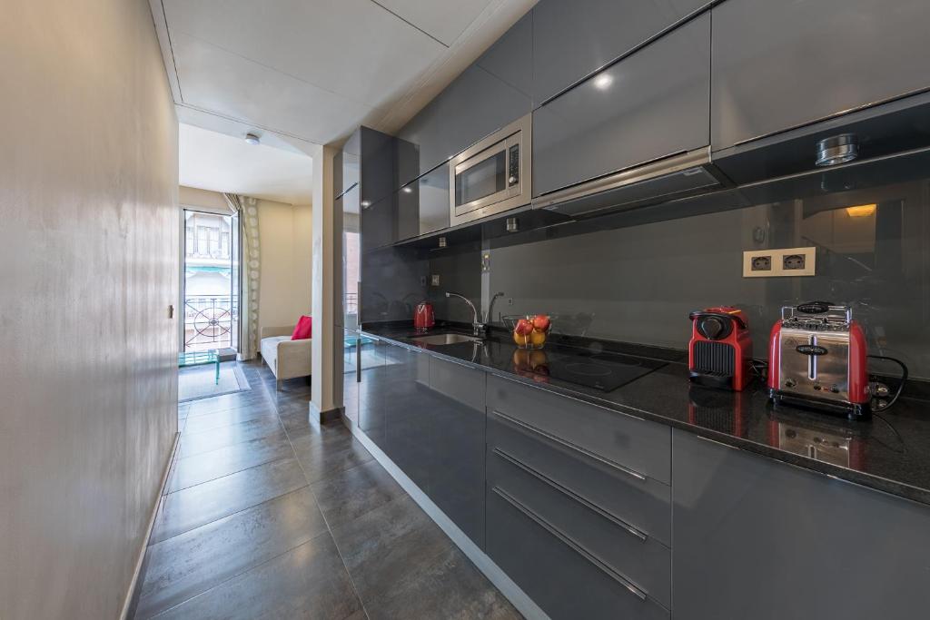 A kitchen or kitchenette at Cituspace Sandoval