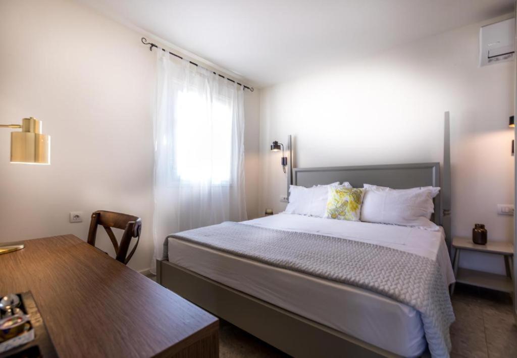 Postel nebo postele na pokoji v ubytování Lemon Tree House