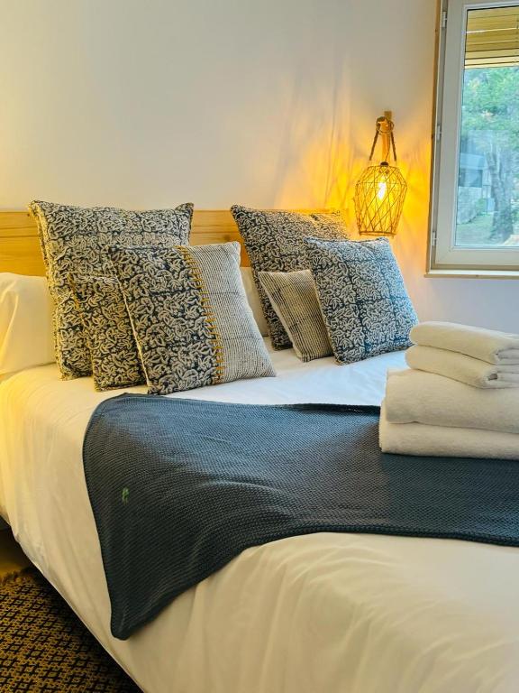 Postel nebo postele na pokoji v ubytování Hostal Sa Teula