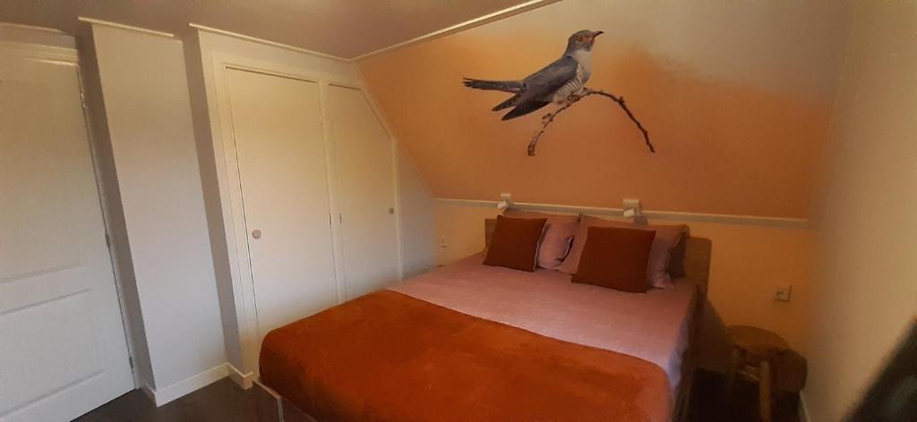 Postel nebo postele na pokoji v ubytování B&B de Zilverreiger