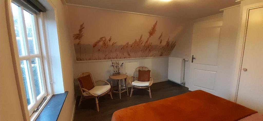Posezení v ubytování B&B de Zilverreiger