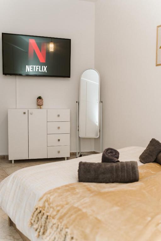 Postel nebo postele na pokoji v ubytování Filoxenia Katerini