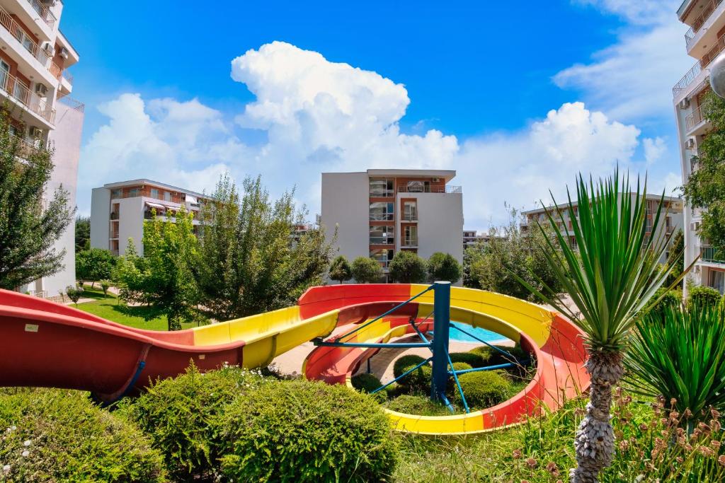 a group of colorful slides in a park at Imperial Fort Club in Sveti Vlas