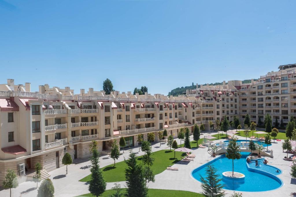 an aerial view of a large apartment complex with a courtyard at Seaside Apartment in Varna City