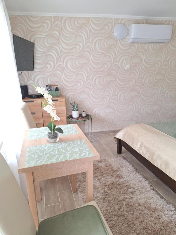 Postel nebo postele na pokoji v ubytování Várfal apartman