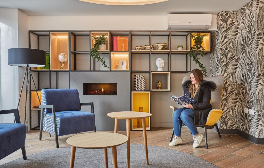 Posezení v ubytování Appart'hôtel Odalys City - Nîmes Arènes - Palais des Congrès