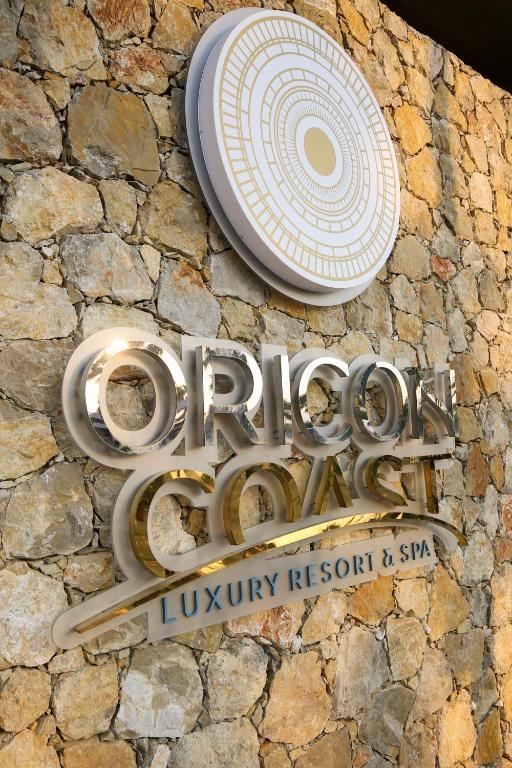 Ein Zertifikat, Auszeichnung, Logo oder anderes Dokument, das in der Unterkunft Oricon Coast Luxury Resort ausgestellt ist