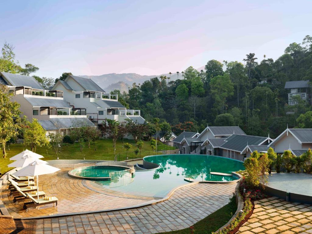 Bazén v ubytování Scenic, Munnar - IHCL SeleQtions nebo v jeho okolí