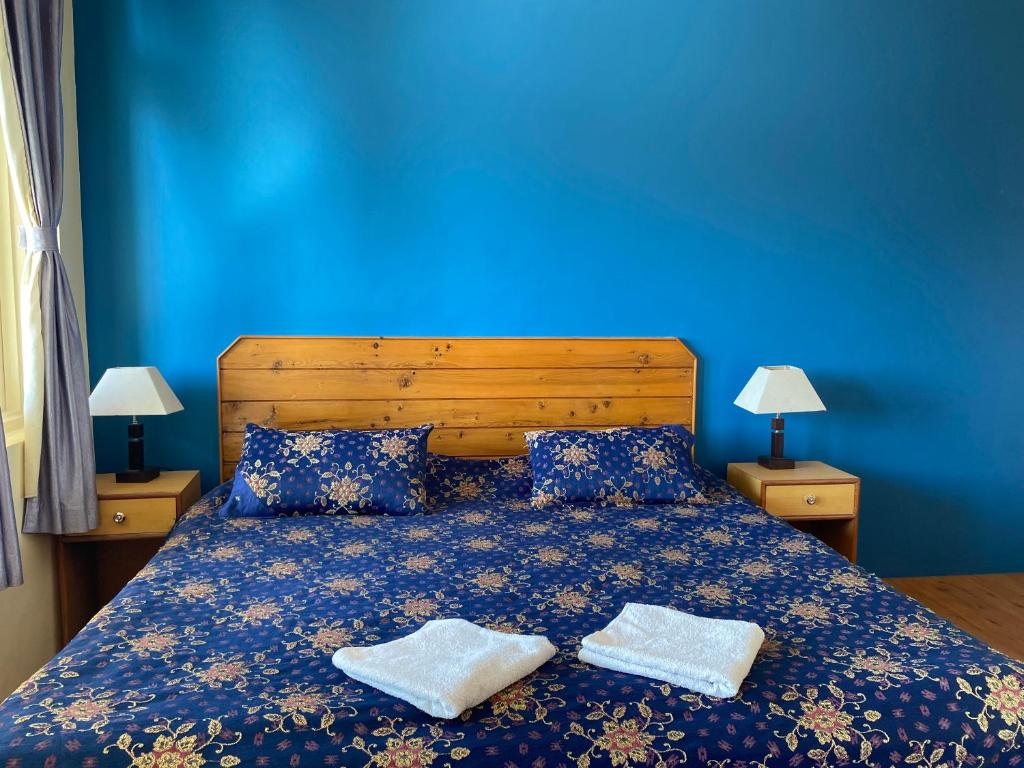 Postel nebo postele na pokoji v ubytování Jagatram Niwas Guesthouse Dharamkot