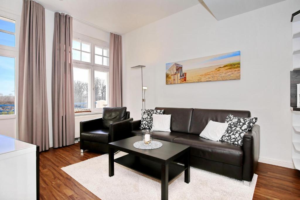 Posezení v ubytování Haus am Park Wohnung 32