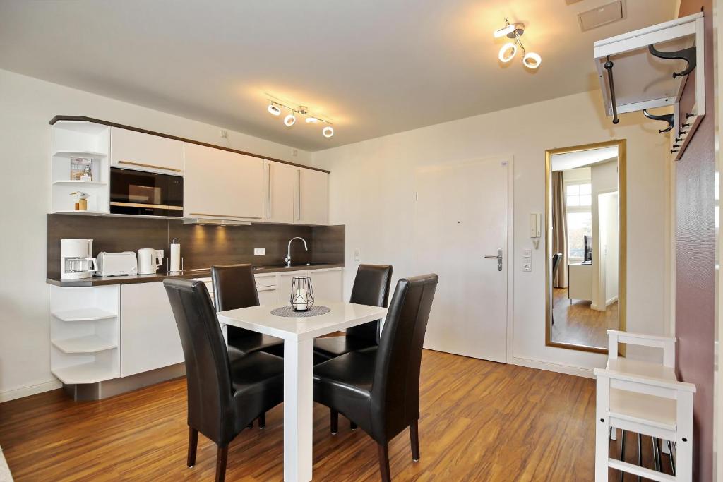 Kuchyň nebo kuchyňský kout v ubytování Haus am Park Wohnung 32