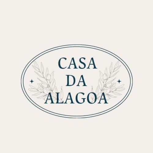 a badge with the text caasa da alagoza at Casa da Alagoa in Batalha