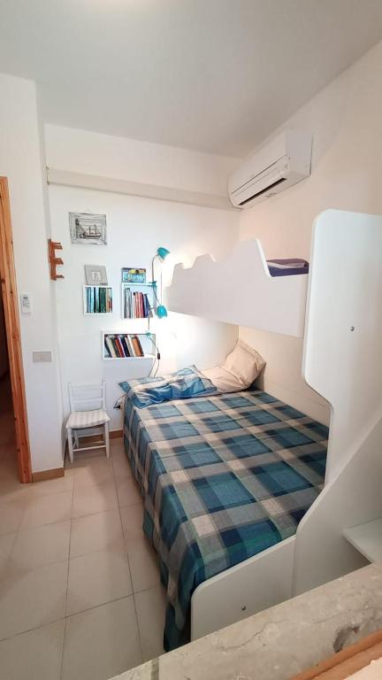 Łóżko lub łóżka w pokoju w obiekcie casa luisa3br