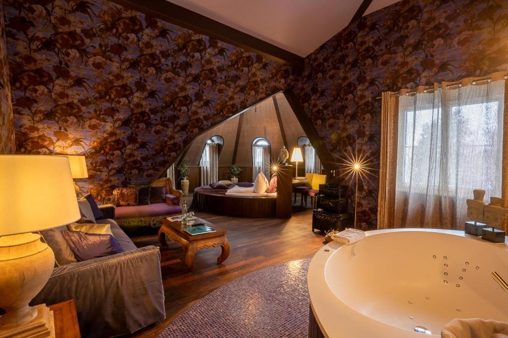 Postel nebo postele na pokoji v ubytování Seerose Resort & Spa