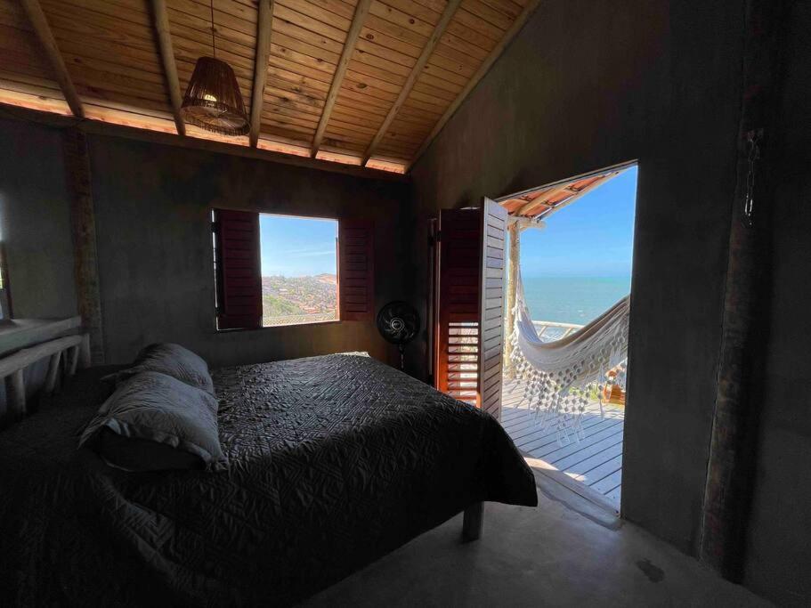 Postel nebo postele na pokoji v ubytování Chalé Azul