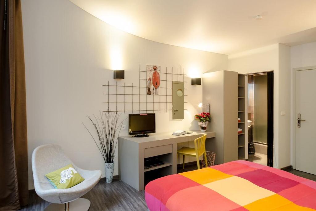 Postel nebo postele na pokoji v ubytování BXLROOM Guesthouse