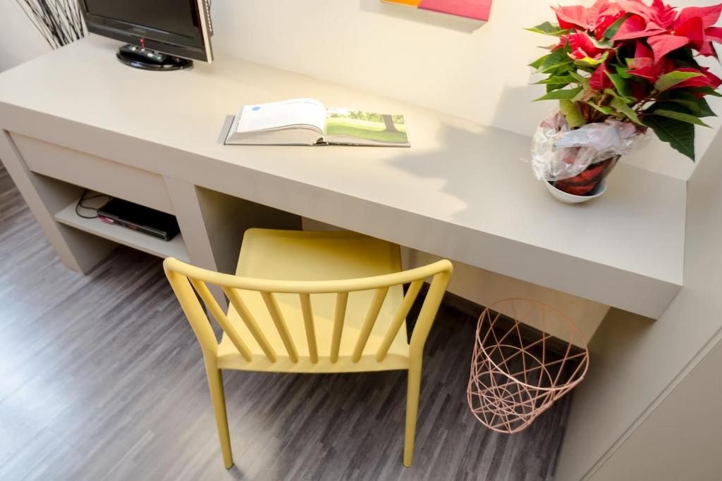 TV a/nebo společenská místnost v ubytování BXLROOM Guesthouse