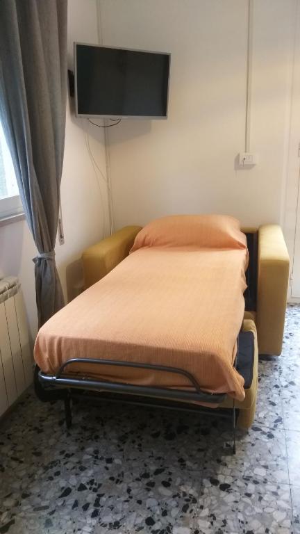 A television and/or entertainment centre at Il Merlo