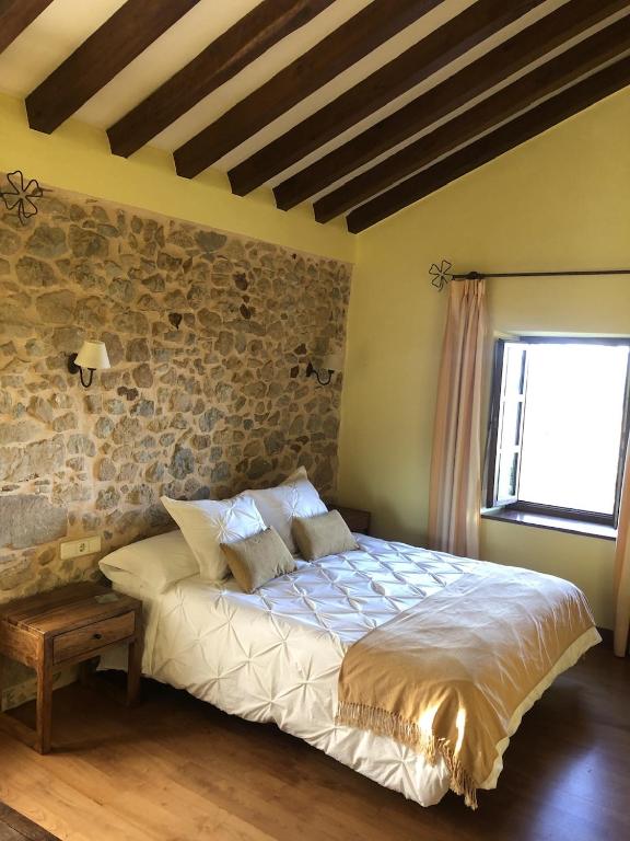 Postel nebo postele na pokoji v ubytování Casa Rural Trebol4Hojas