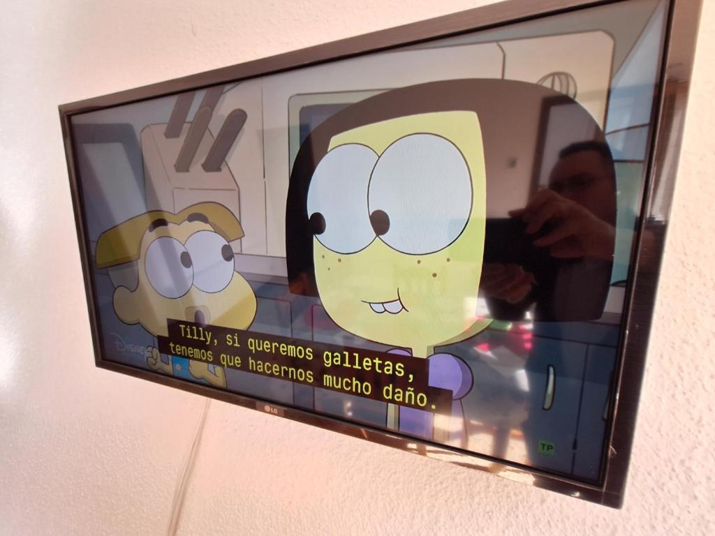 TV a/nebo společenská místnost v ubytování apartament Eliette 3