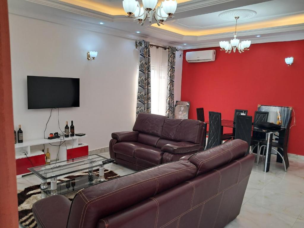 Зона вітальні в APPARTEMENT NEW STANDING CITE CHIRAC YASSA