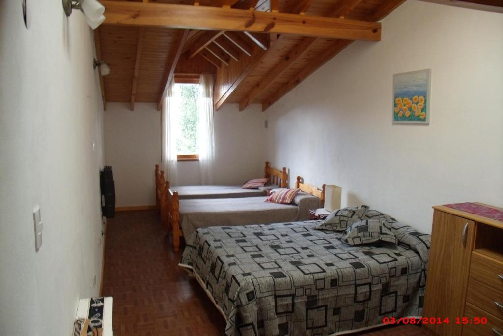 Postel nebo postele na pokoji v ubytování Colibrí House