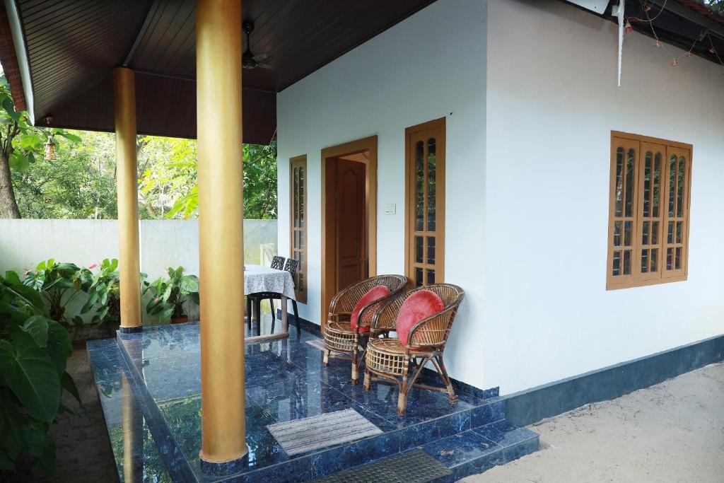 Balkón nebo terasa v ubytování Marari Neena Beach homestay