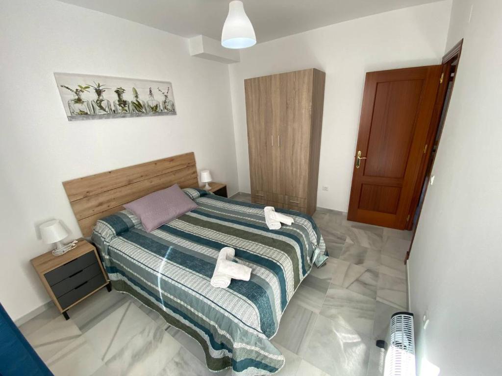 Posteľ alebo postele v izbe v ubytovaní LAS INFANTAS HOME