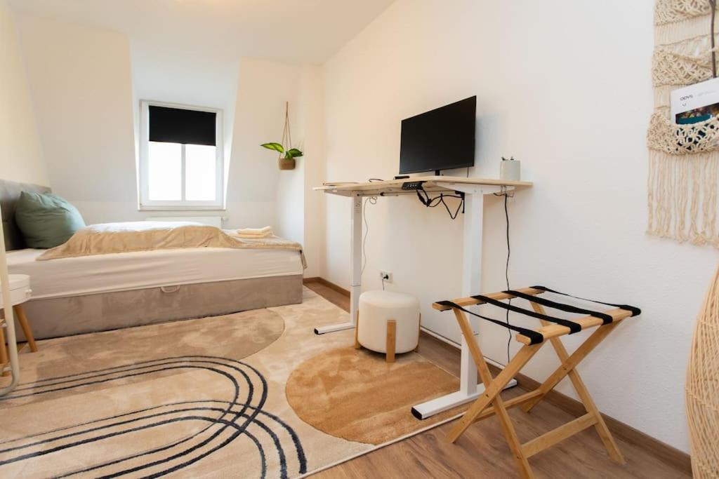 TV a/nebo společenská místnost v ubytování BOHO CHIC Markkleeberg, in Seenähe, 8 min bis ins Leipziger Zentrum mit der S-Bahn, Fast WIFI