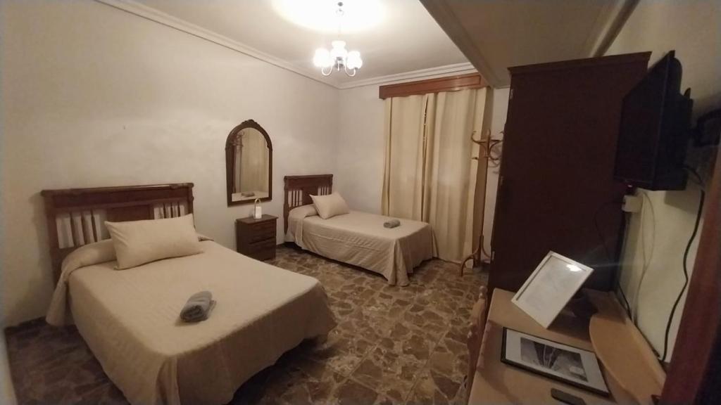 Posteľ alebo postele v izbe v ubytovaní Magdeleine Village