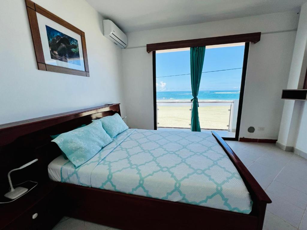 Postel nebo postele na pokoji v ubytování Hotel Sierra Negra