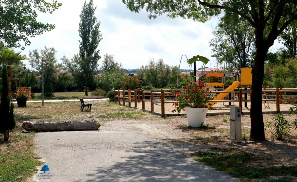 Zahrada ubytování Mobilhome Côté mer - 3 Chambres - Climatisé - TV