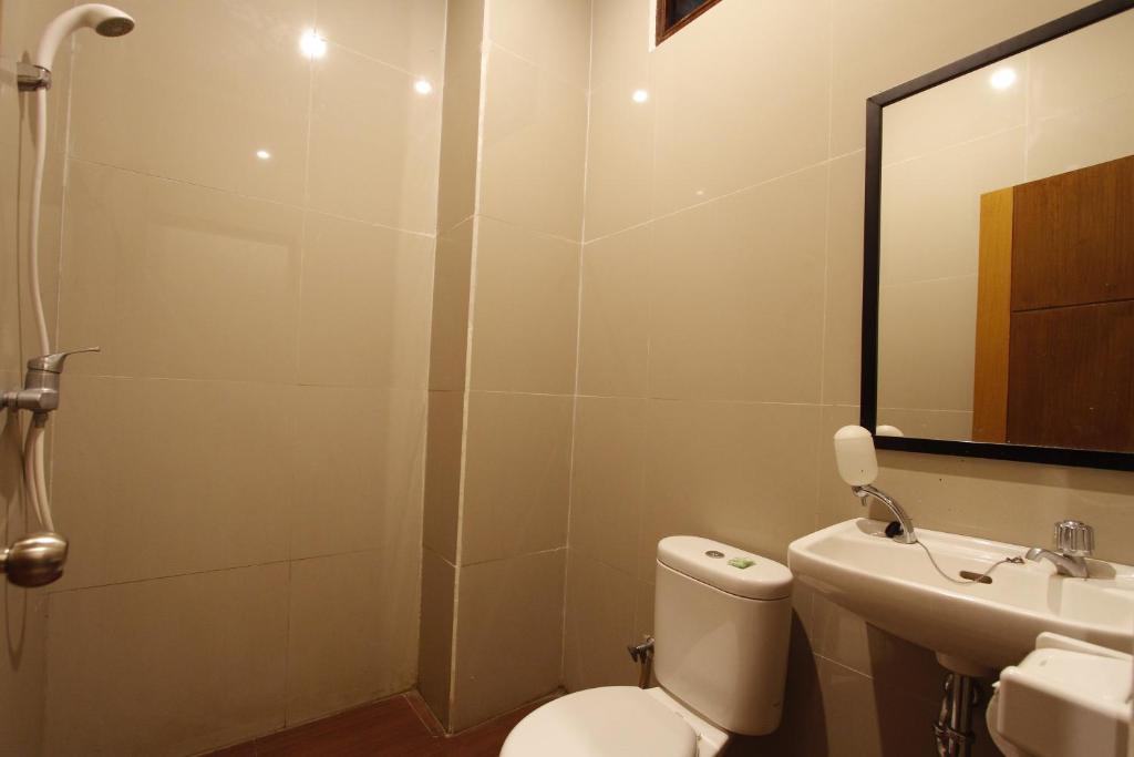 Koupelna v ubytování Palapa Hotel