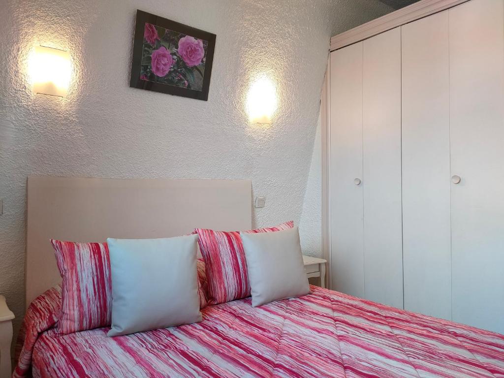 Postel nebo postele na pokoji v ubytování Hôtel le Littoral