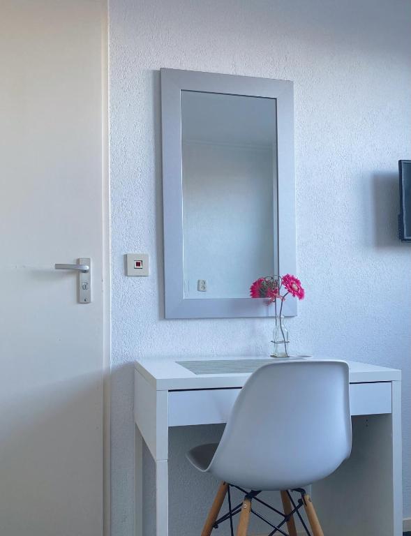 TV a/nebo společenská místnost v ubytování Hotel Berg en Bos