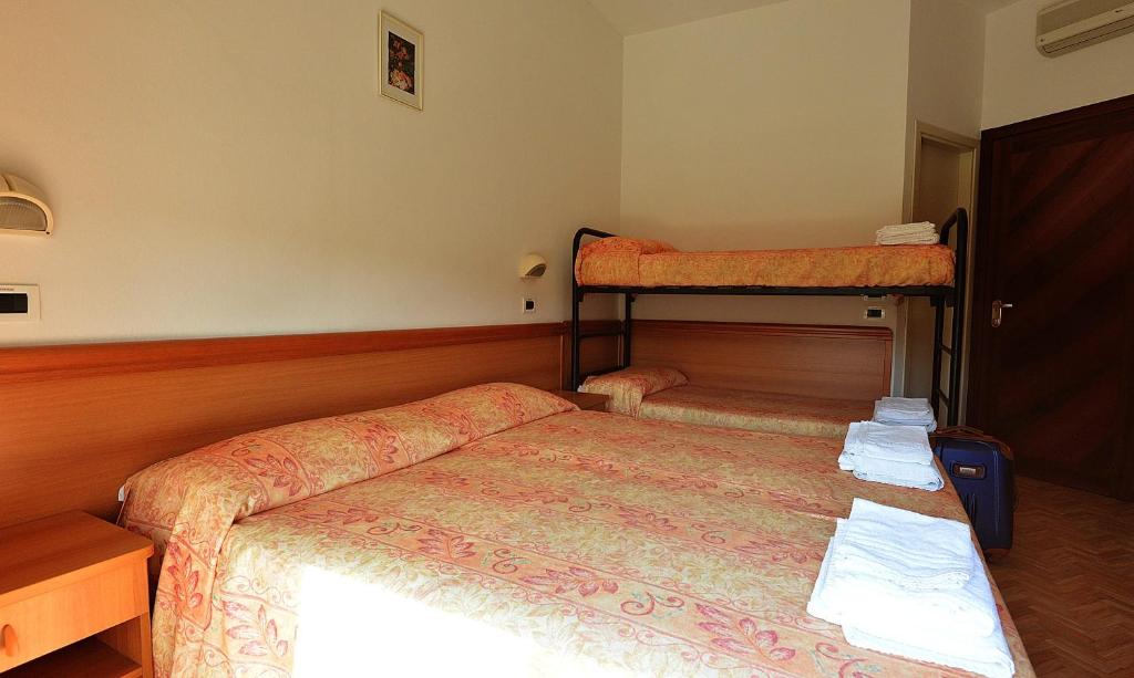 Postel nebo postele na pokoji v ubytování Hotel Bamar