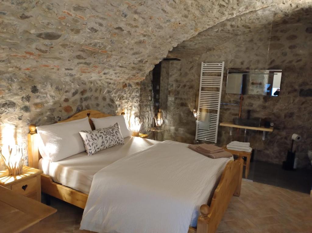 Postel nebo postele na pokoji v ubytování Antica Corte